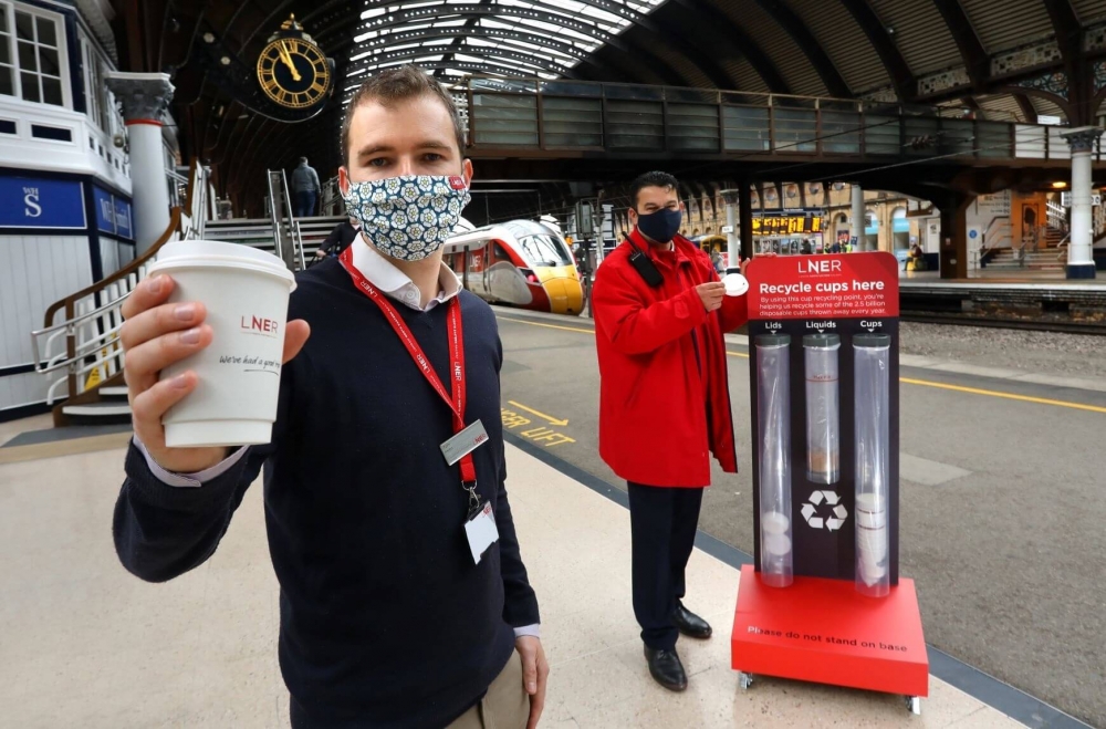 LNER and Forge REcycling - cup recycling on station platform