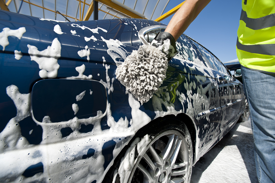 Man washing a car