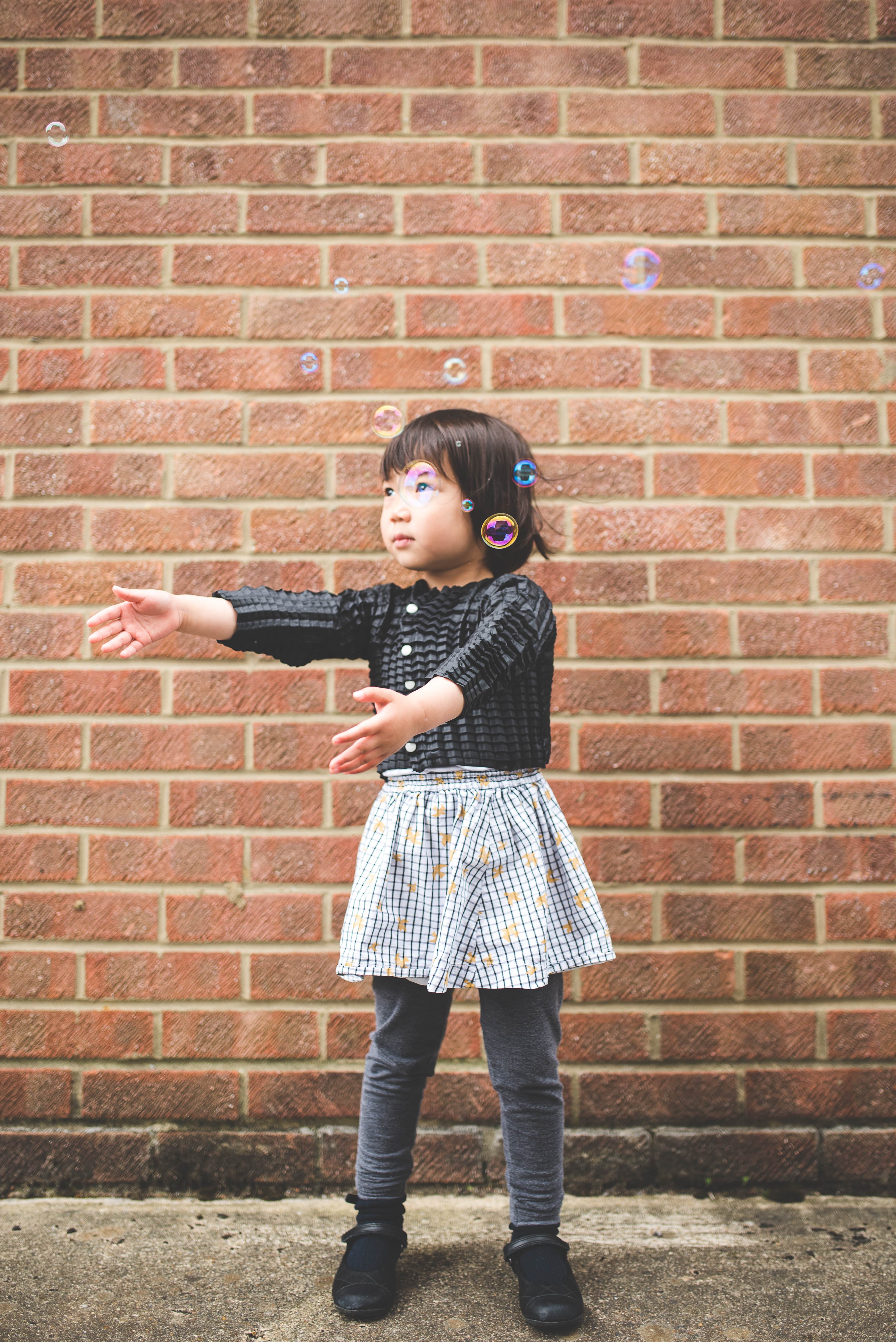 Girl wearing 'growing' kids clothes