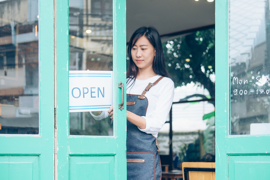 a welcoming cafe owner