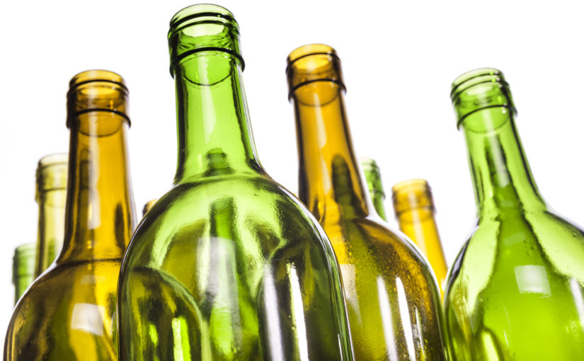 Empty glass bottles waiting for recycling