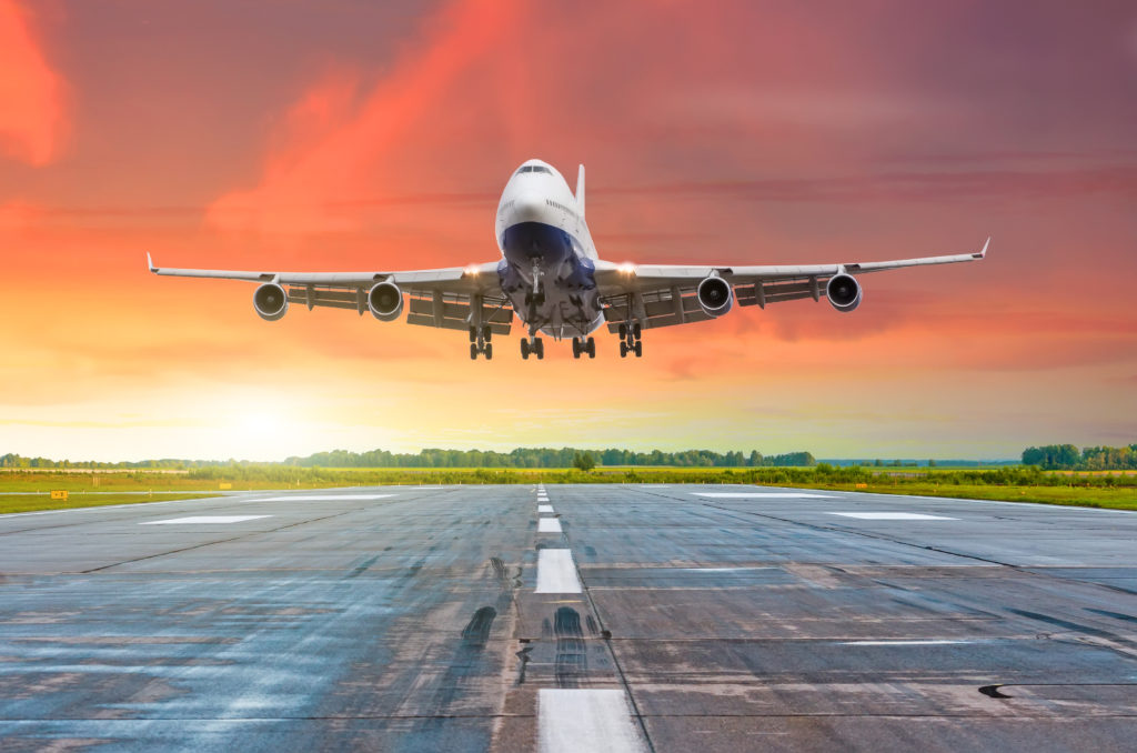 An airplane taking off, creating carbon emissions