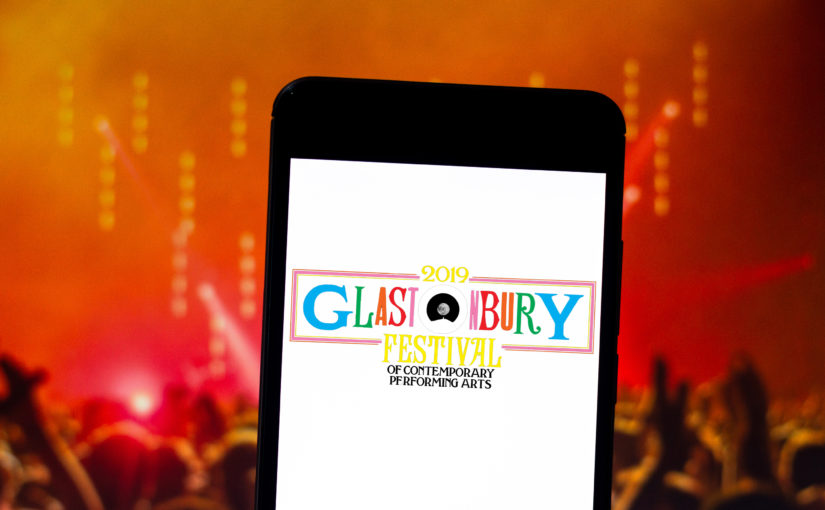 Glastonbury Festival logo on mobile phone