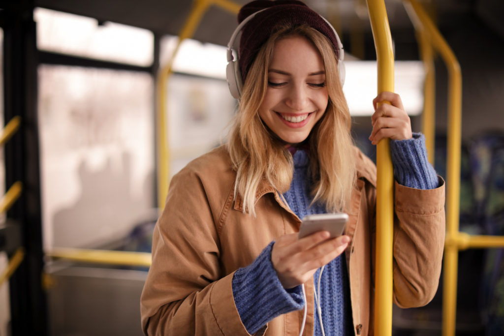 woman on public transport heading to festival