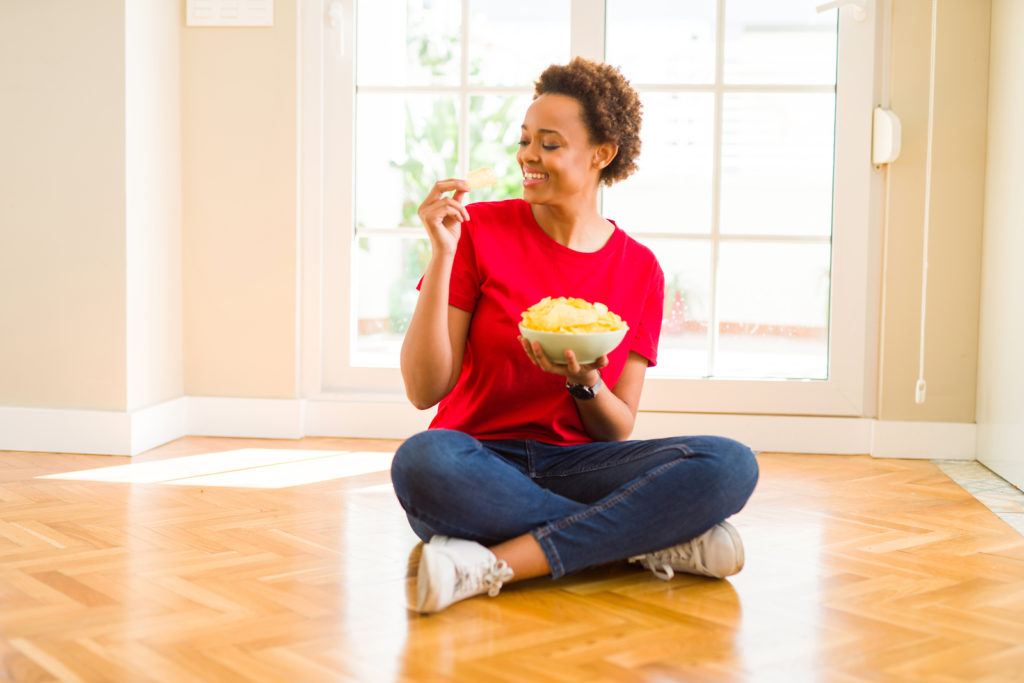 woman eating crisps