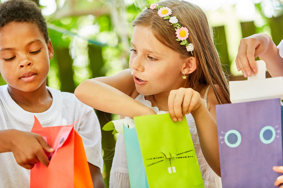 kids playing with eco-friendly paper party bags