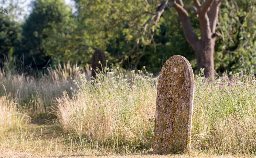 a gravestone in English countryside