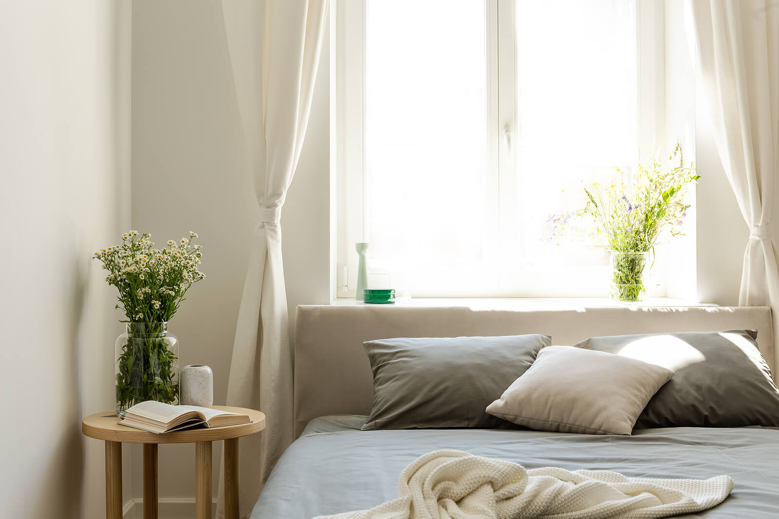 A clean, natural, neutral and sunny bedroom